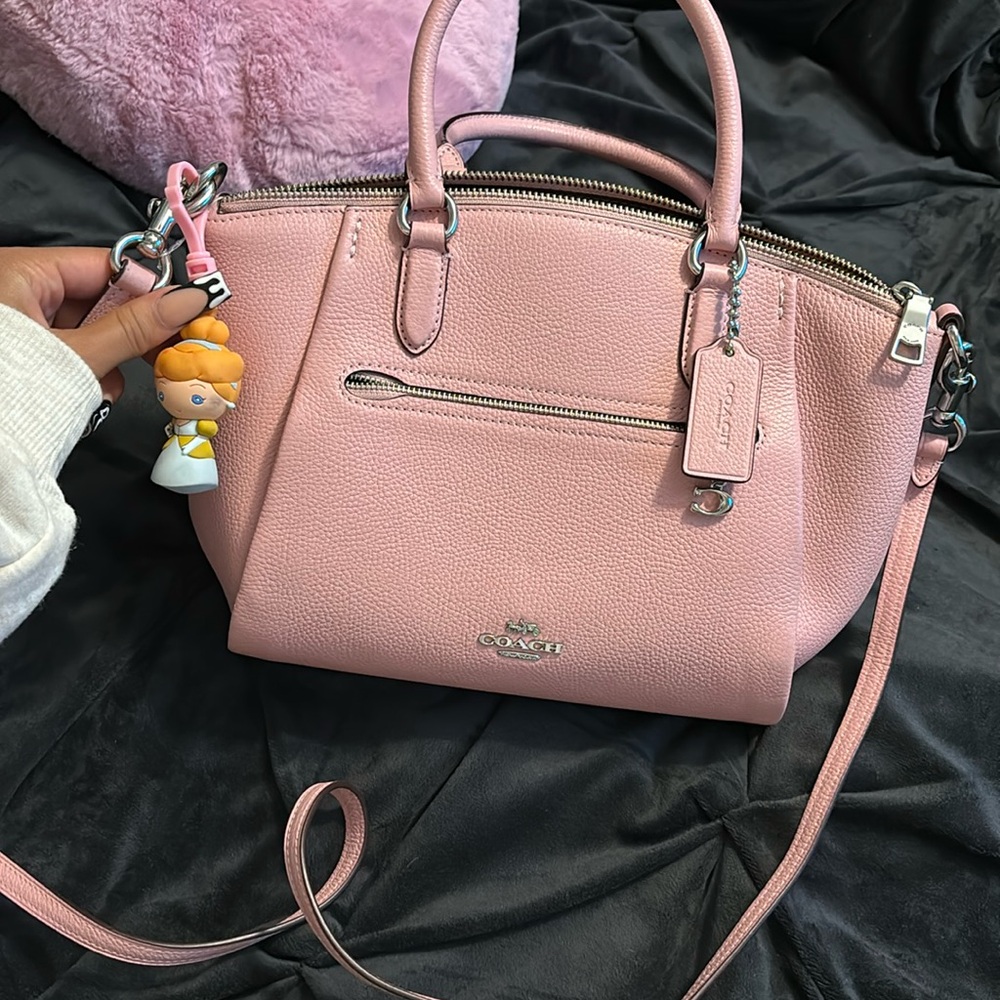 A pink Coach purse